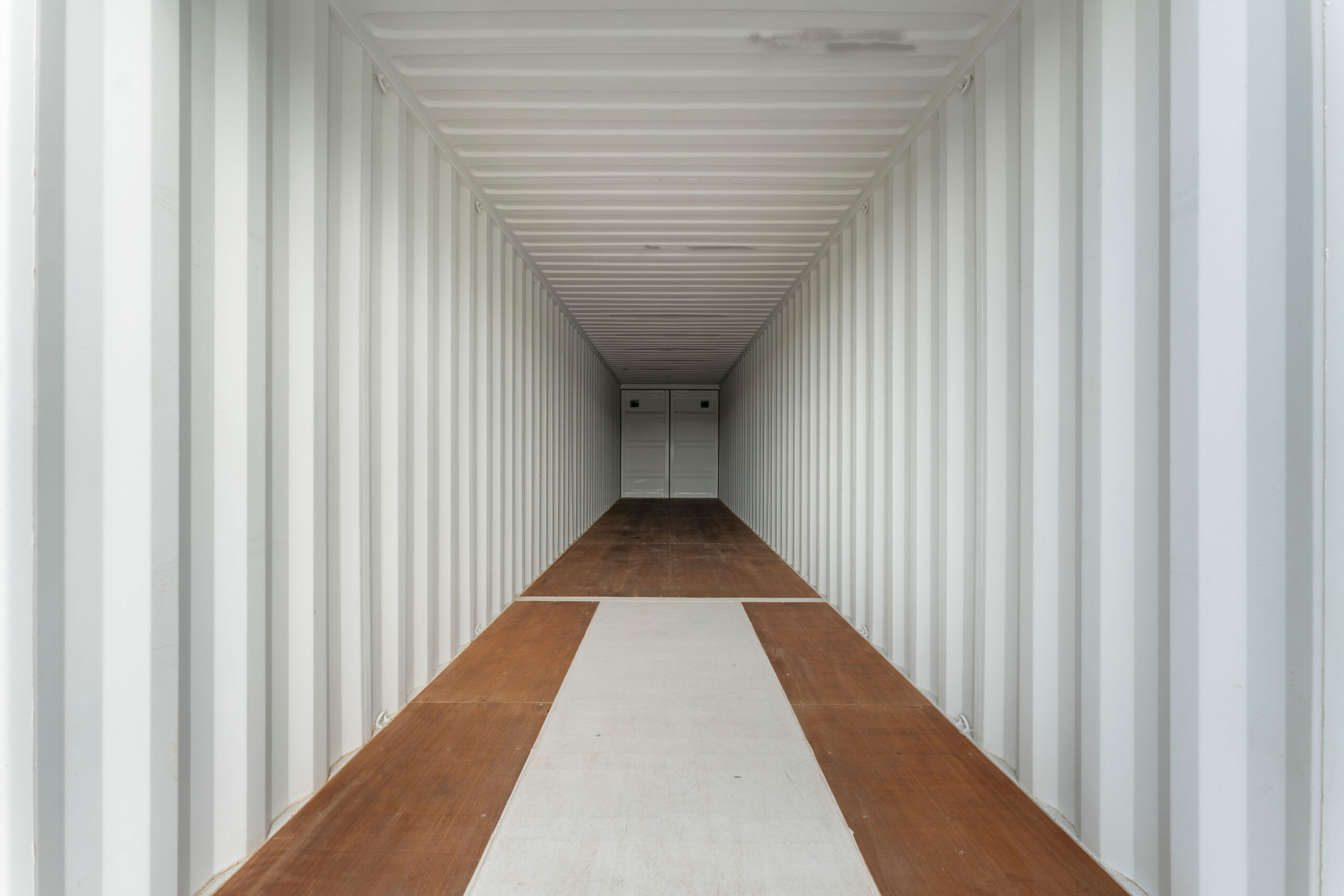 Clean interior of a long container storage unit