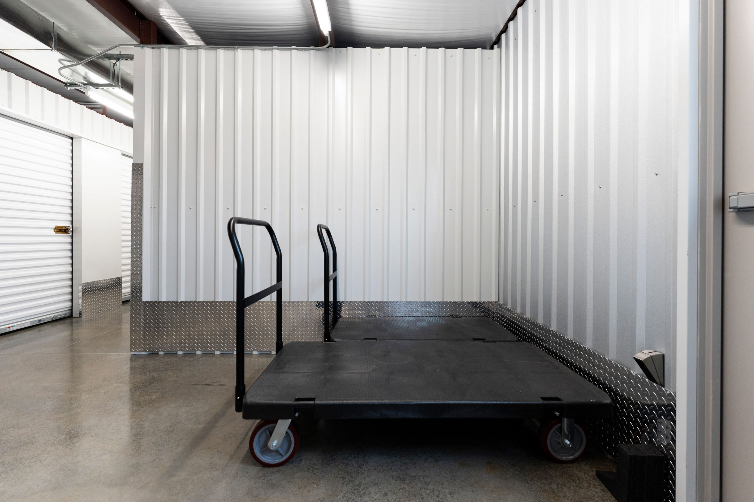 Flatbed moving carts available inside the indoor storage building